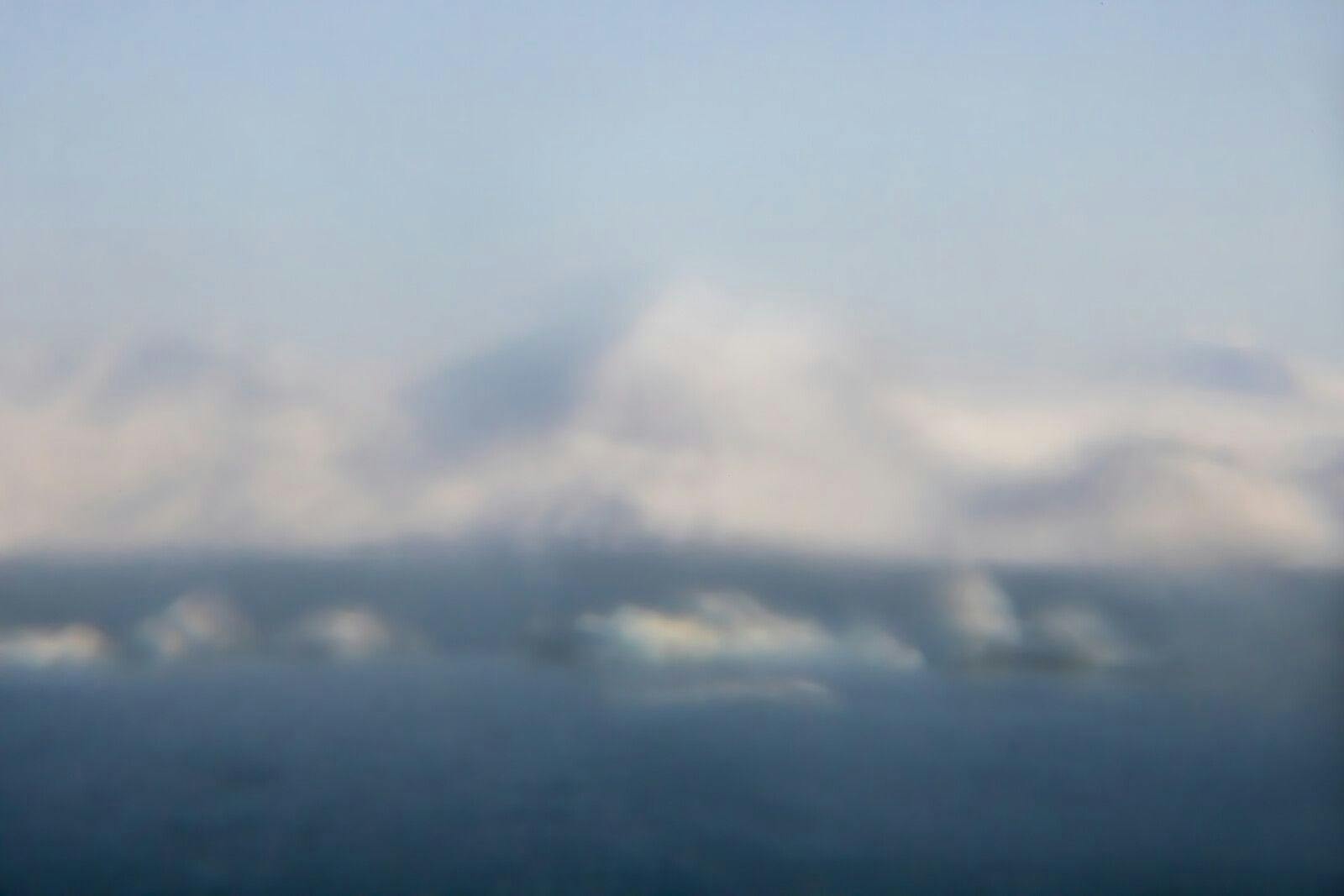 Tristan Duke, Icebergs Adrift, 2022, Digital photograph made using a lens made from glacier ice. Archival pigment inkjet print on cotton rag paper, image courtesy of the artist