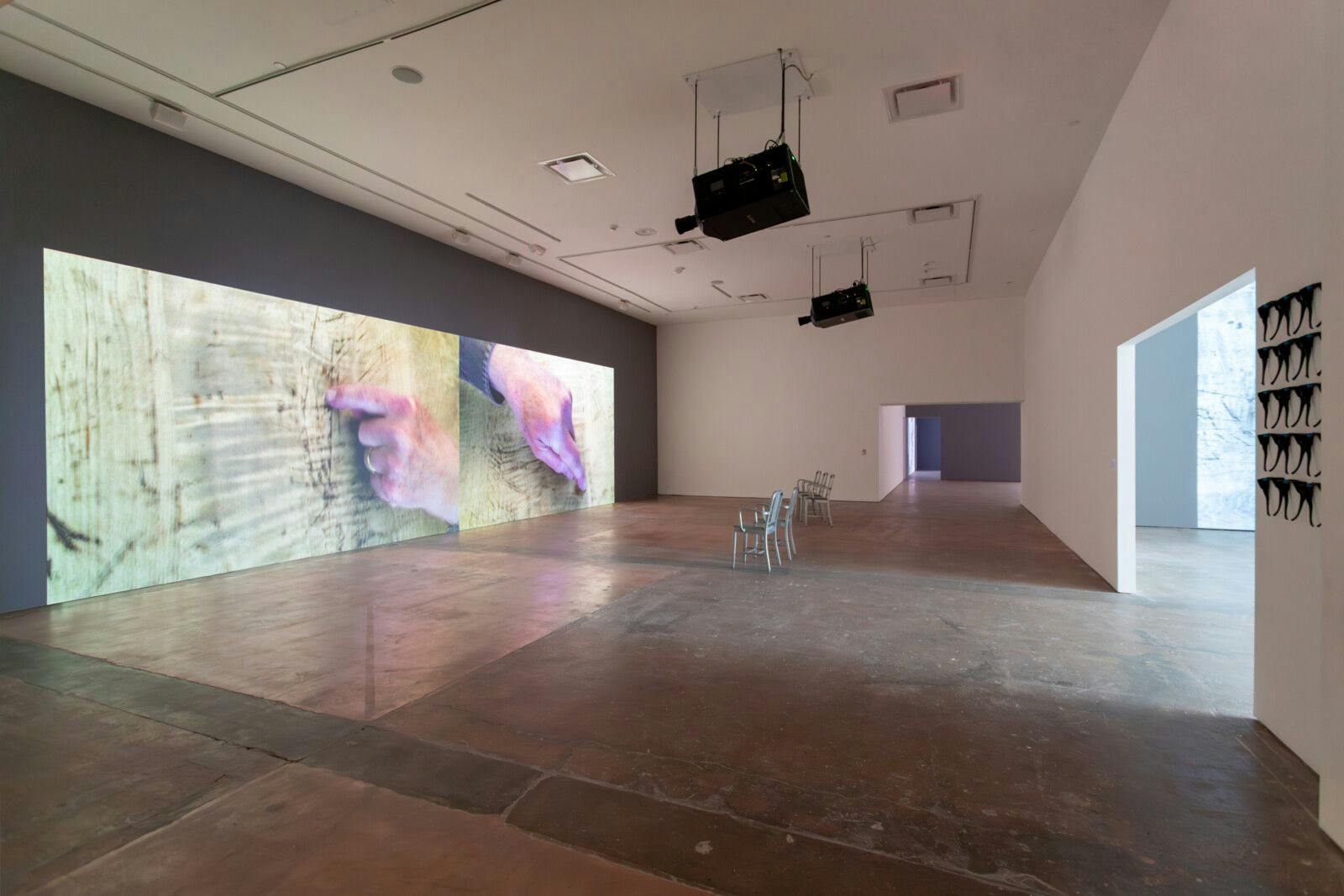 Bruce Nauman Self-Portrait at 80, 2022 4K 120fps 3D projection (black and white, stereo sound), continuous play projection size: 114 x 203 inches (289,6 x 515,6 cm) as installed 15 minutes 45 seconds Courtesy of the artist and Sperone Westwater, New York © 2023 Bruce Nauman / Artists Rights Society (ARS), courtesy Sperone Westwater, New York
